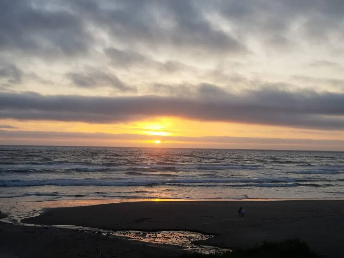 Walking the beach at sunset